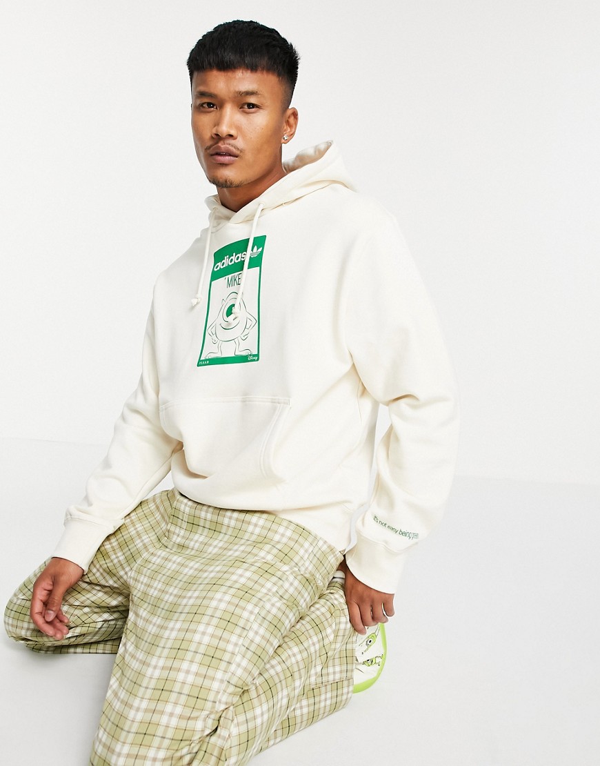 Adidas Originals x Disney unisex hoodie with Mike Wazowski print in off white