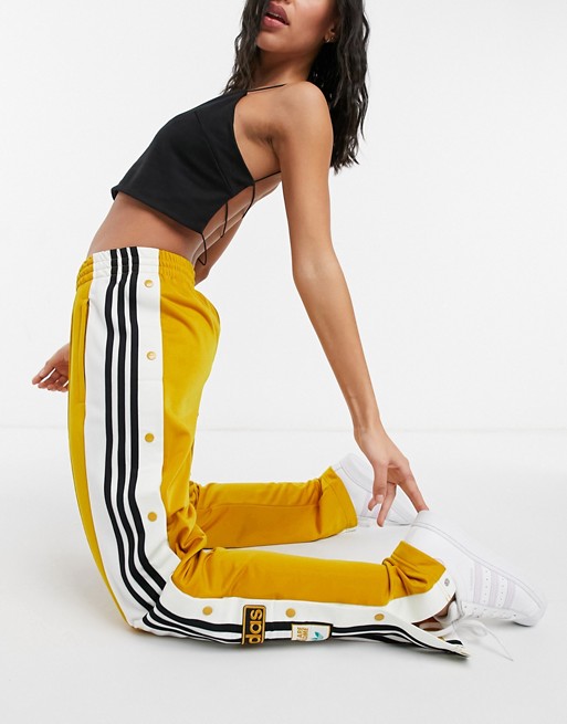 adidas Originals x Girls are Awesome wide leg trousers in yellow