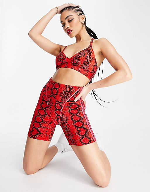 Women adidas Originals x IVY PARK snakeprint legging shorts in red 