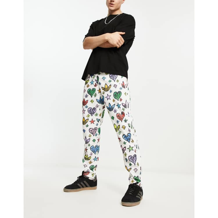 adidas Originals Unisex Jeremy Scott Monogram Firebird Tracksuit Pants -  White - Hibbett