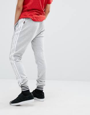 adidas originals three stripe cuffed sweat pants in grey