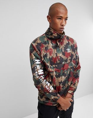 adidas Originals x Pharrell Williams Hu Hiking - Giacca a vento mimetica  con zip corta CY7871 | ASOS