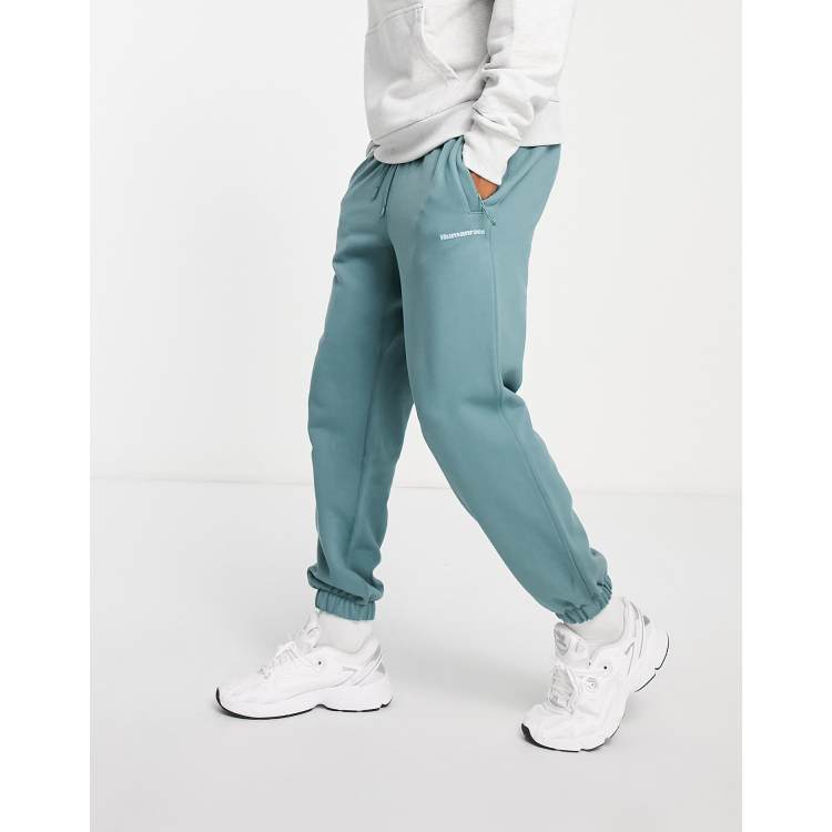 adidas Originals x Pharrell Williams premium basics joggers in hazy emerald ASOS