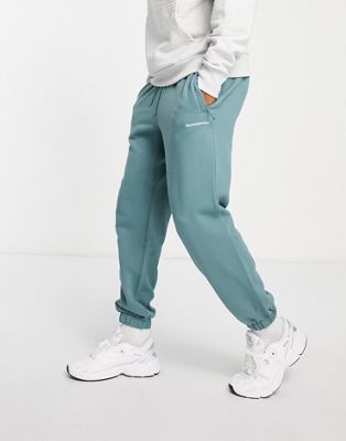 adidas Originals x Pharrell Williams premium basics joggers in hazy emerald