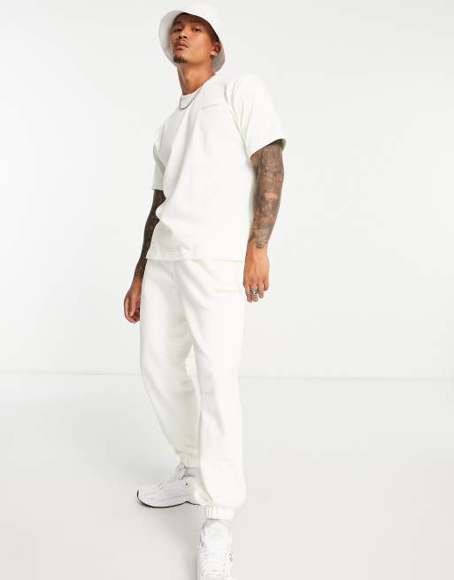 adidas Originals x Pharrell Williams premium basics joggers in off white