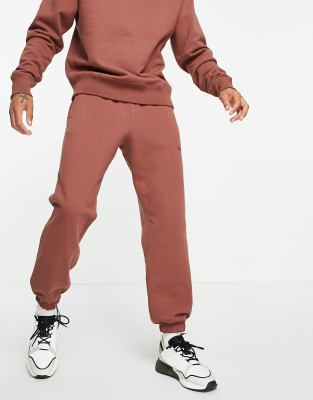 adidas Originals x Pharrell Williams premium sweatpants in burgundy-Red