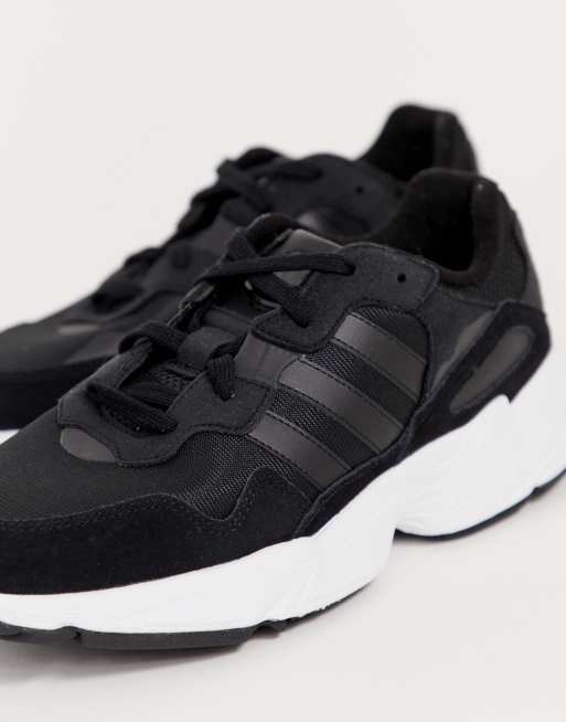 Adidas originals yung og black & white sales sneakers