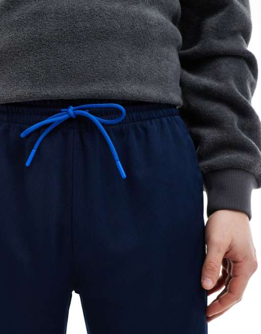 adidas Originals zip flare pants in night indigo | ASOS
