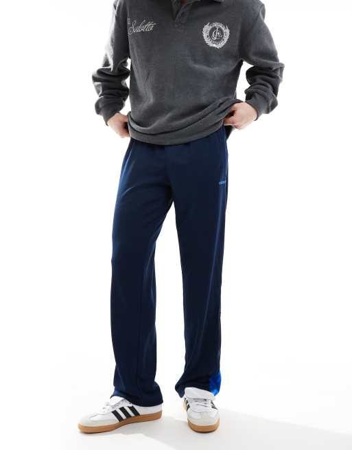 adidas Originals Zip flare pants in night indigo | ASOS