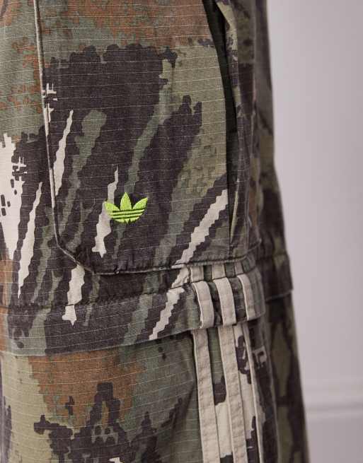 adidas Originals Zip-off cargo pants in multicolor / orbit green