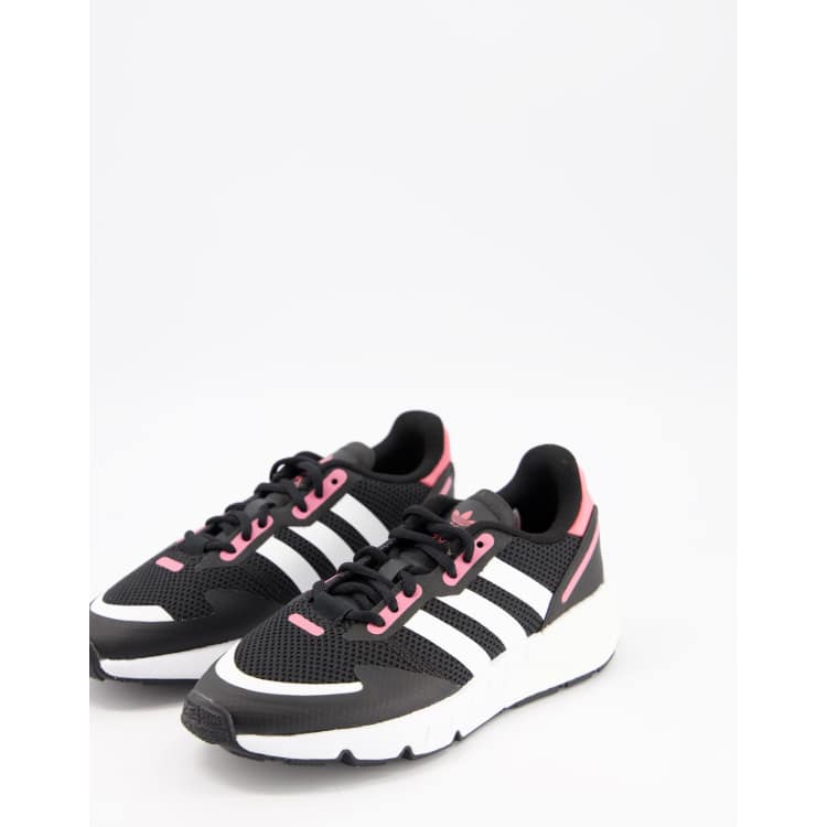 adidas Originals ZX 1K Boost trainers in black with pink heel tab