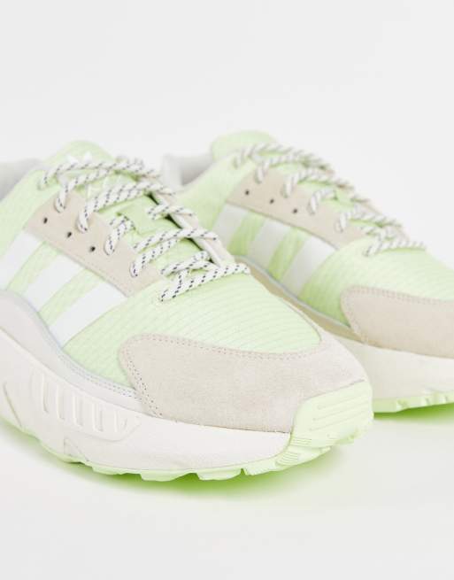 adidas Originals ZX 22 Boost sneakers in green and off white