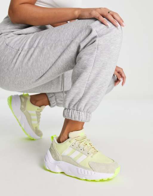 adidas Originals ZX 22 Boost trainers in off white and yellow