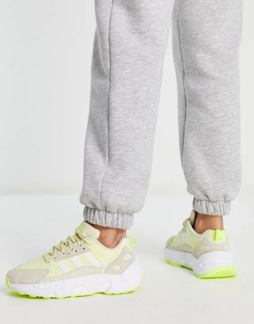 adidas Originals ZX 22 Boost trainers in off white and yellow