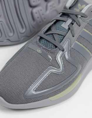 grey flux trainers