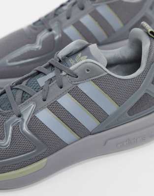 grey flux trainers
