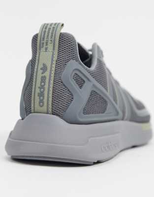 grey flux trainers