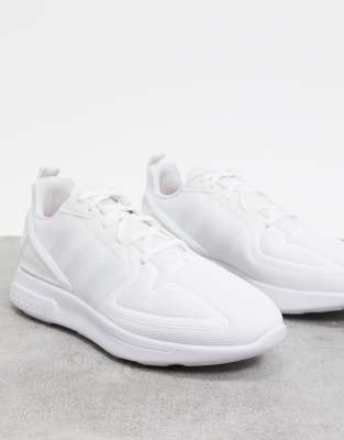 white adidas flux trainers