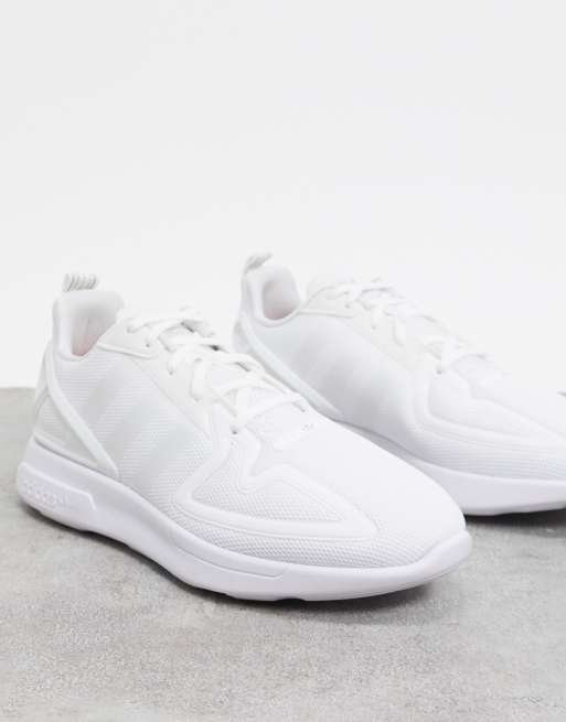 White adidas flux store trainers