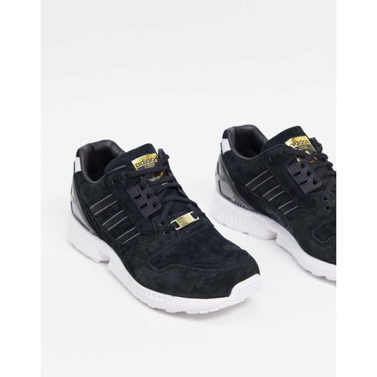 Adidas zx store gold schwarz