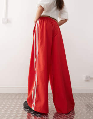 adidas Orignals Adicolor Firebird oversized track pants in bright red