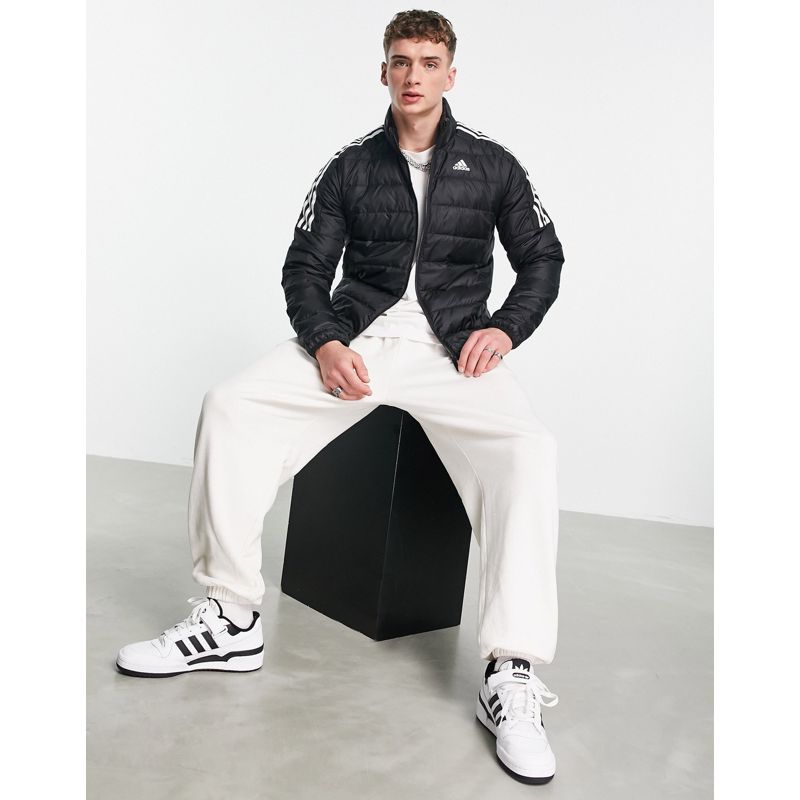 Uomo Activewear adidas - Outdoor - Piumino imbottito nero con tre strisce