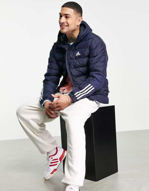 adidas Outdoor puffer jacket with hood and three stripes in navy ...