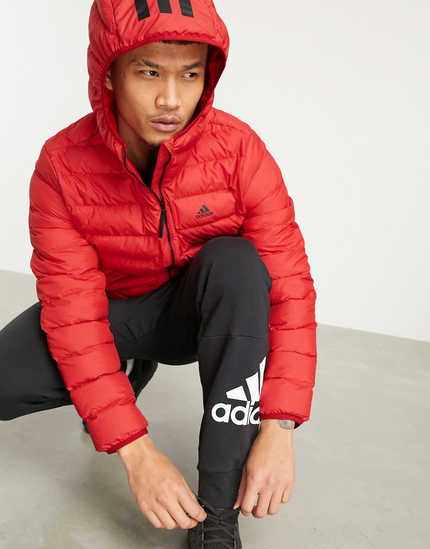 adidas Outdoors hooded puffer jacket in red-Black