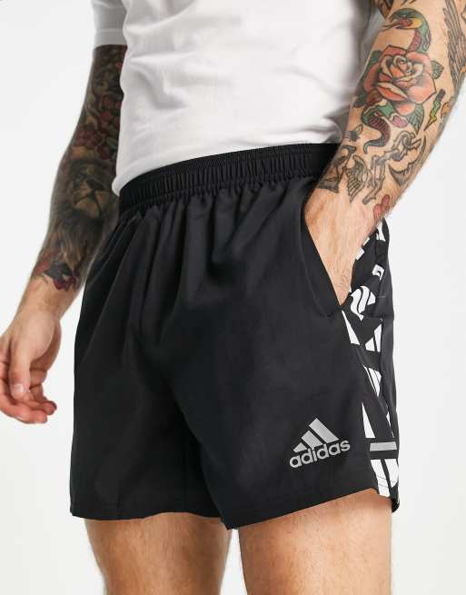 adidas Own the Run Celebration shorts in black | ASOS