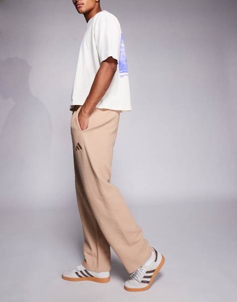 adidas - Pantalon de survêtement en tissu gaufré - Beige - view 1