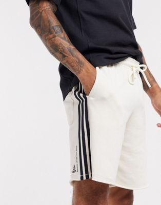 pantaloni adidas strisce bianche