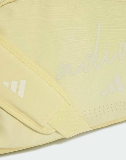 adidas performance - Adidas Defender - Borsa a sacco da donna con grafica allover giallo doppio/grigio orbita, 4 di 4