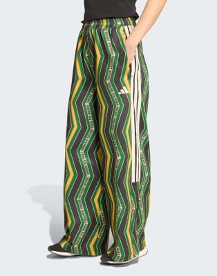 adidas Performance - adidas x FARM Tiro - Trainingshose in Schwarz/Amazon Green/Prelove