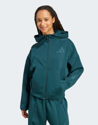 adidas Performance - adidas Z. N.E. - Kapuzenjacke in Aurora Ivy mit Reißverschluss-Grün