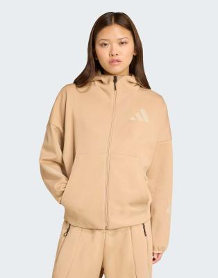 adidas Performance - adidas Z. N.E. - Kapuzenjacke in warmem Sandbeige mit Reißverschluss-Braun