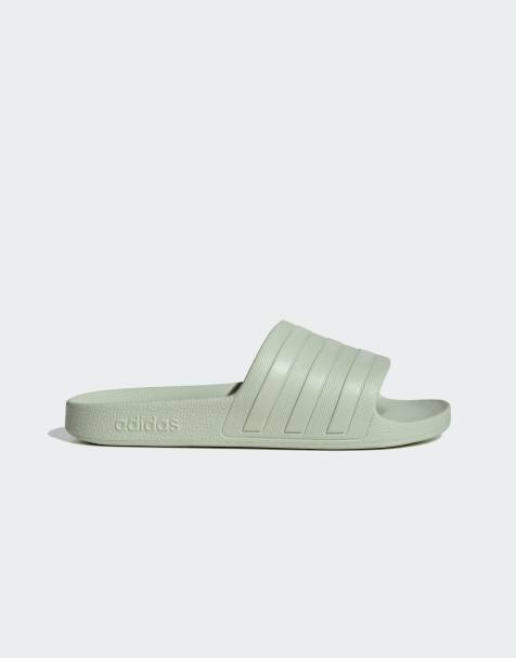 adidas performance Adilette aqua slides in linen green / linen green - view 1