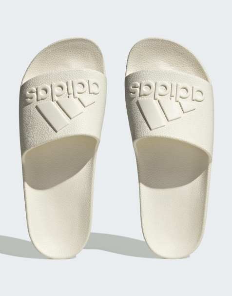 adidas Performance – Adilette – Naturvita badtofflor - view 1