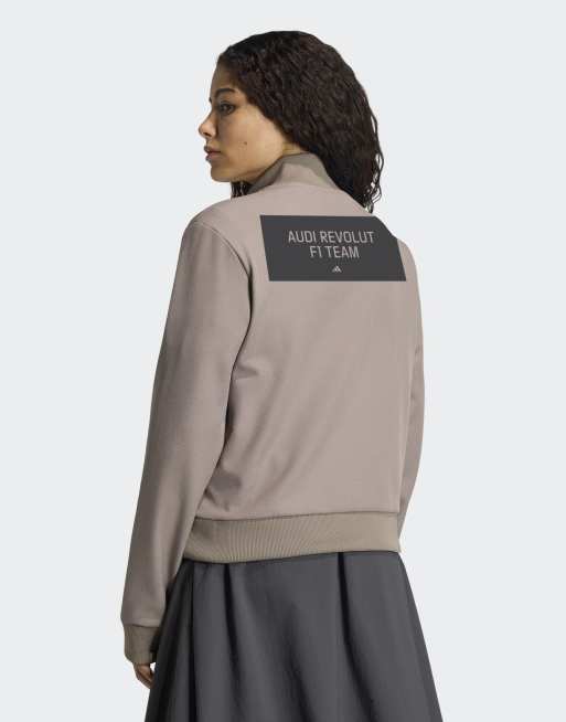 adidas performance Audi formula one team elevated track top in simple brown / hi-res red, 2 of 4