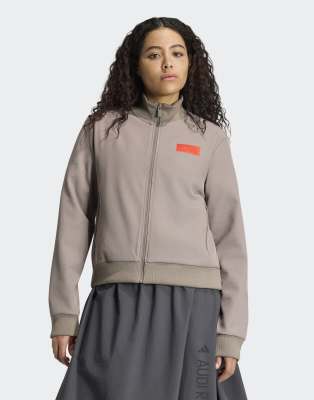 adidas Performance - Audi Formula One Team Elevated - Trainingsoberteil in Simple Brown/Hi-Res-Rot