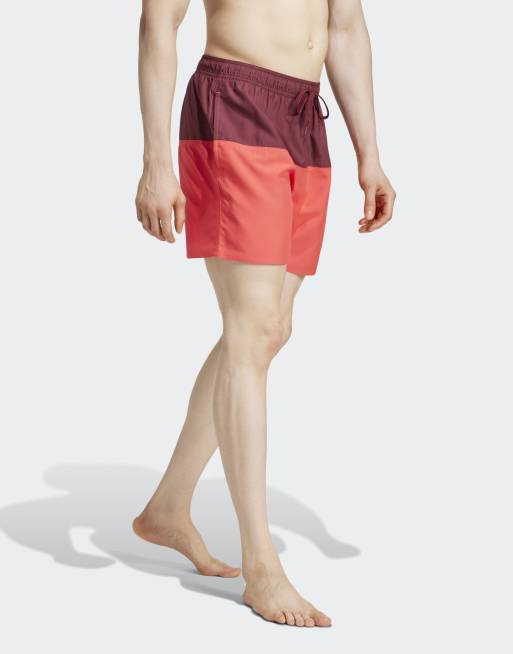 adidas Performance – Colorblock CLX – Kurze Badeshorts in Shadow Red / Semi Lucid Red