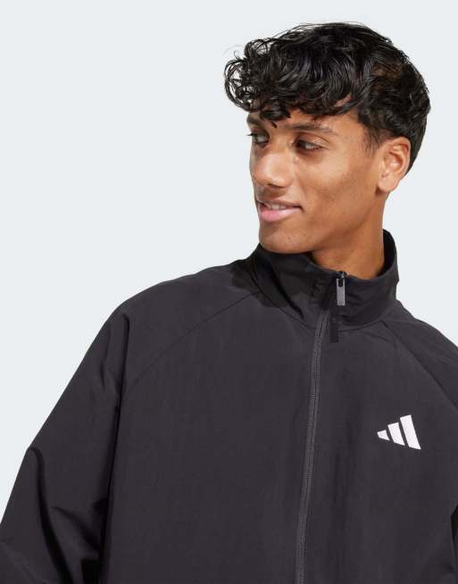 adidas performance - Essential - Giacca a vento nera e bianca con logo piccolo, 2 di 5