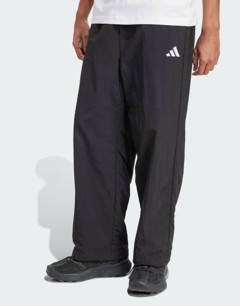 adidas performance Essential small logo woven open hem pant in black / white - view 1