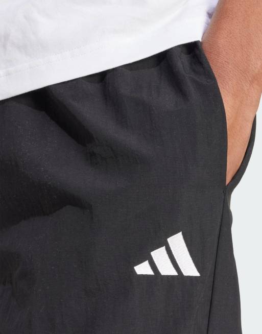 adidas performance Essential small logo woven open hem pant in black / white, 3 of 4