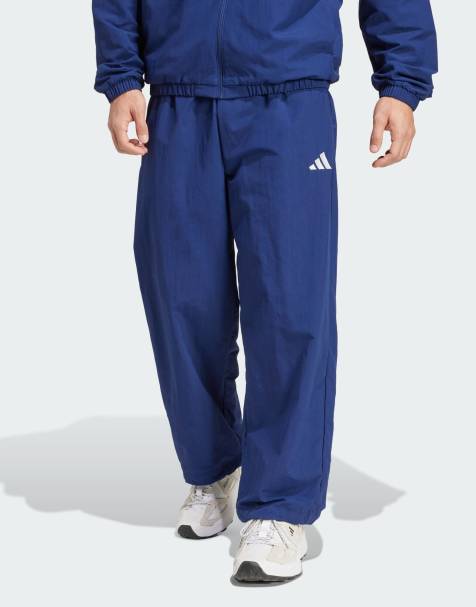 adidas performance Essential small logo woven open hem pant in dark blue / white - view 1