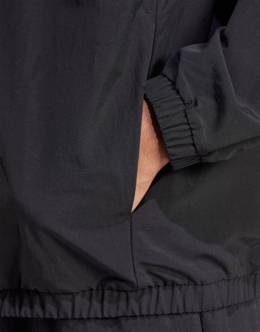 adidas Performance – Essential – Windjacke in Schwarz mit kleinem Logo in Weiß, 3 von 5