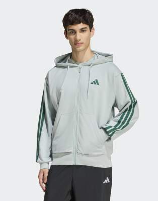 adidas performance Essentials 3-stripes french terry full-zip hoodie in wonder sage / collegiate green