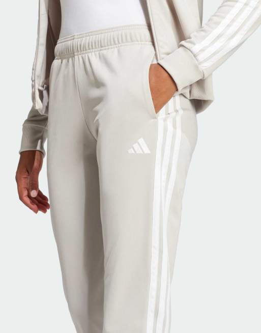 adidas Performance essentials 3-stripes track suit in beige | ASOS