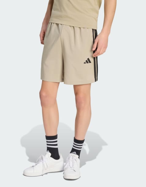 adidas Performance – Essentials – Chelsea – Beige och svarta shorts med tre ränder - view 1