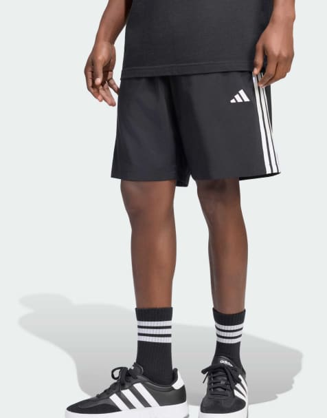 adidas performance – Essentials Chelsea Lite – Shorts aus Webstoff in Schwarz mit den 3 Streifen in Weiß - view 1