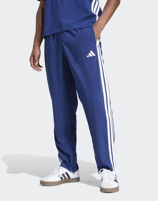 adidas Performance Essentials – Granatowo-białe spodnie z luźnym dołem i 3 paskami